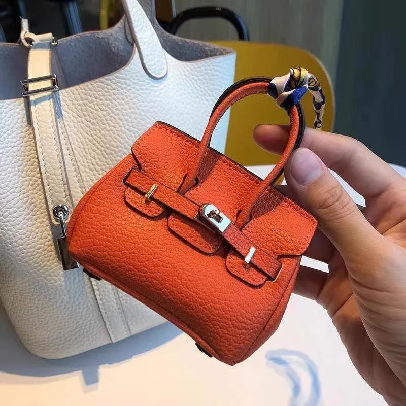 Mini-Anhänger für kleine Taschen, Kopfhörer-Paket, Auto-Schlüsselanhänger, kreativer Anhänger für Geldbörse mit allen passenden roten Umschlägen 9x10cm orange