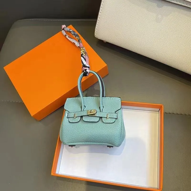 Mini-Anhänger für kleine Taschen, Kopfhörer-Paket, Auto-Schlüsselanhänger, kreativer Anhänger für Geldbörse mit allen passenden roten Umschlägen 9x10cm hellblaue