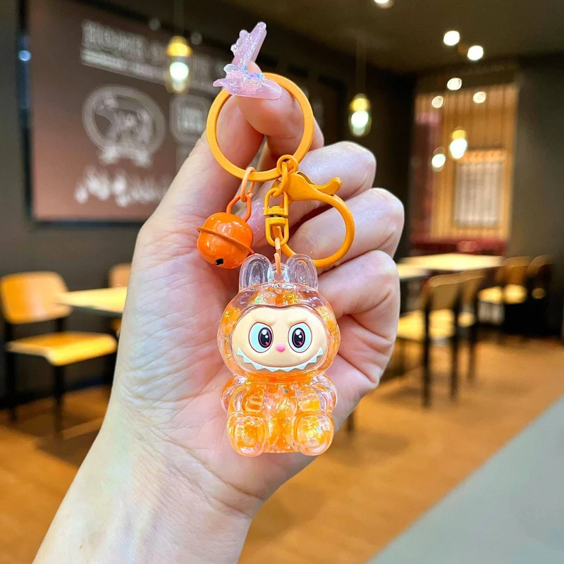 Labubu Plüschpuppe Handy-Anhänger: Niedlicher, farbenfroher, transparenter Rucksack-Anhänger-Schlüsselanhänger orange
