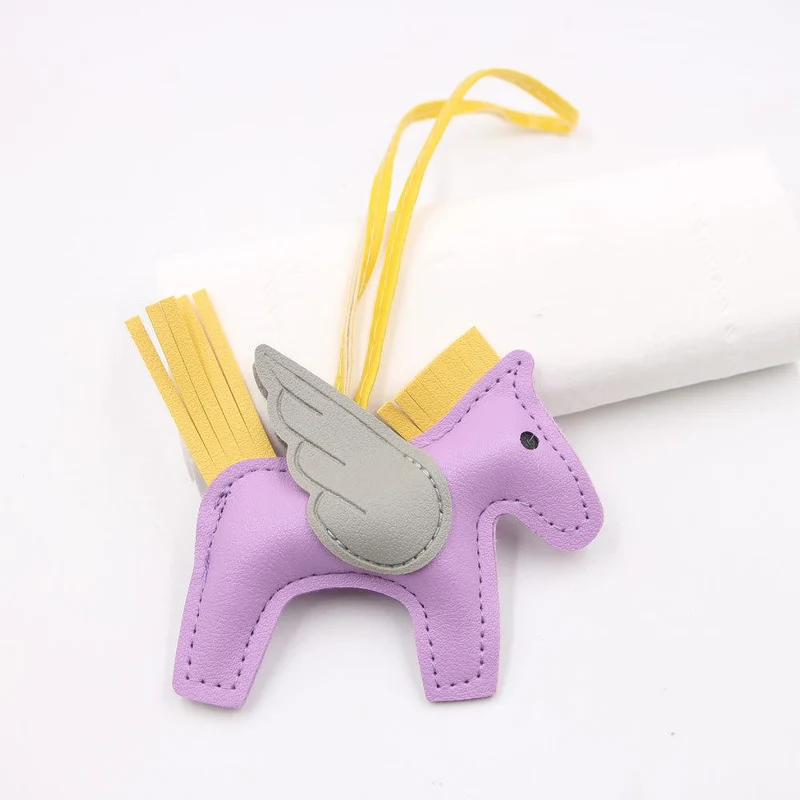 Hot Classic Wing Pony Bag Anhänger Dekorative Accessoires Auto Schlüsselanhänger Anhänger Hochwertige Lederproduktion Tassel winged horse violett