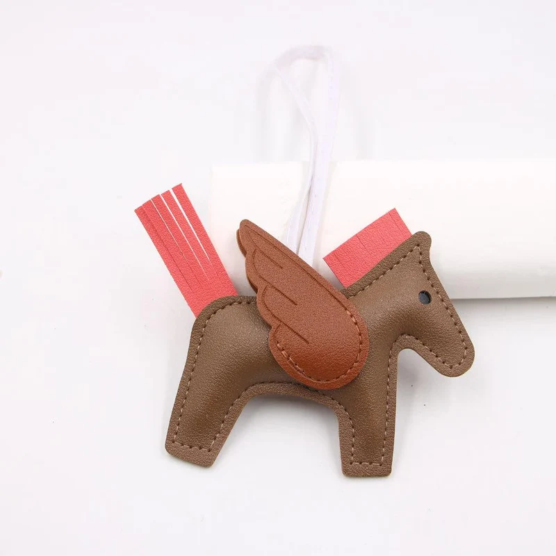 Hot Classic Wing Pony Bag Anhänger Dekorative Accessoires Auto Schlüsselanhänger Anhänger Hochwertige Lederproduktion Tassel winged horse kaffeebraun/braun