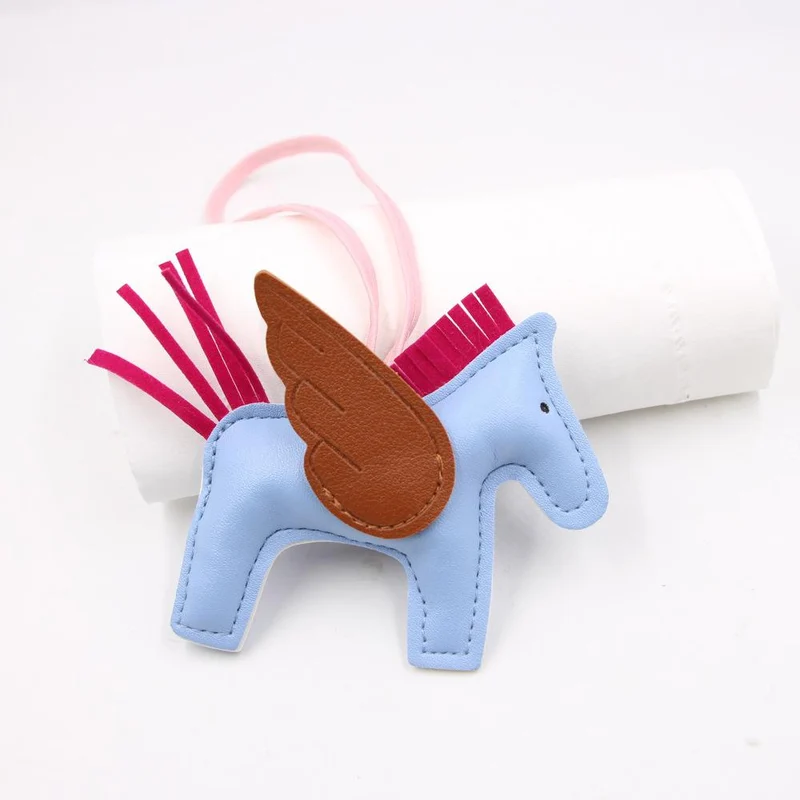 Hot Classic Wing Pony Bag Anhänger Dekorative Accessoires Auto Schlüsselanhänger Anhänger Hochwertige Lederproduktion Tassel winged horse blau
